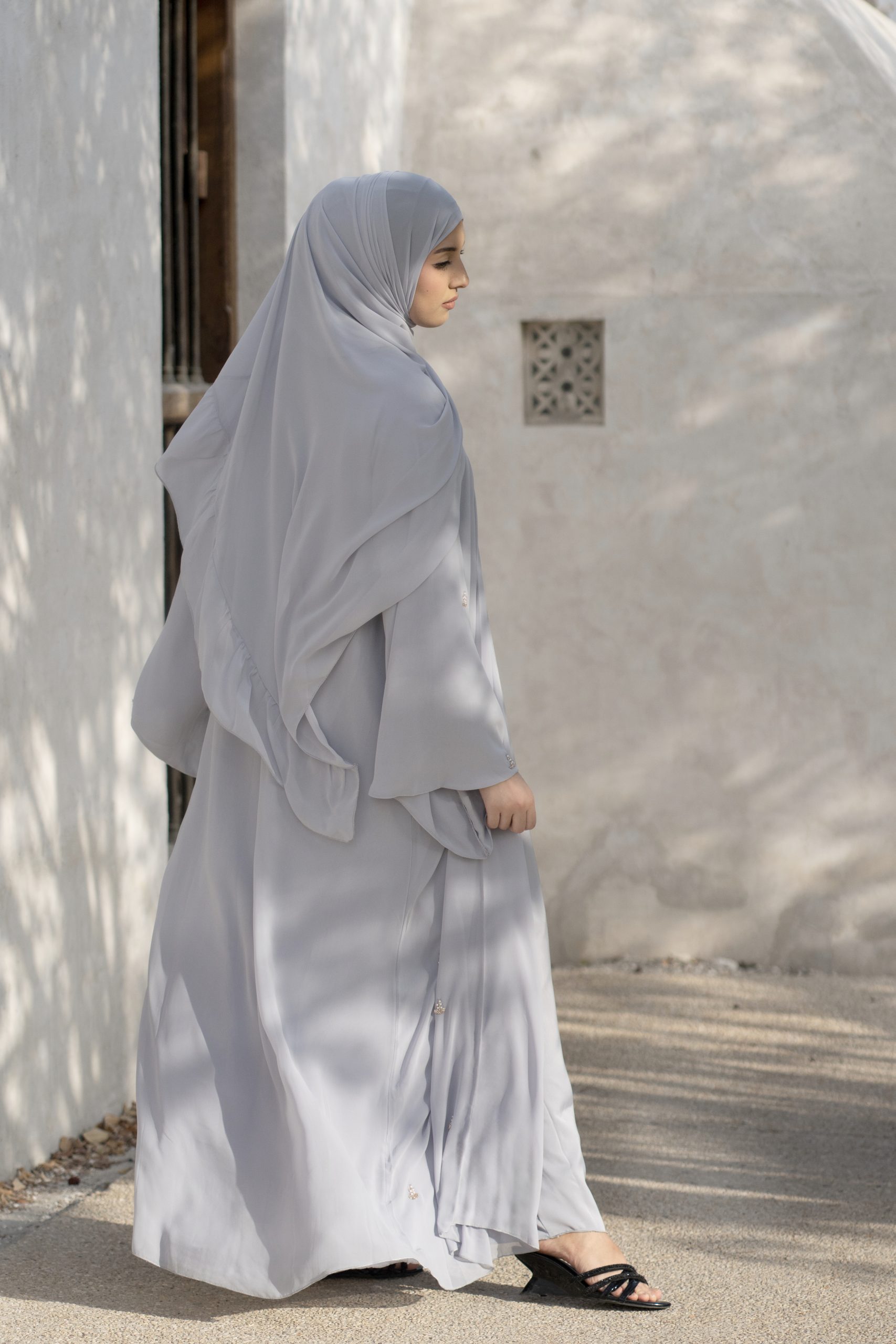 Ela Collection — Luxury 3-Piece Abaya Set A stunning wide A-line silhouette with enchanting butterfly sleeves, crafted from exquisitely soft chiffon. Adorned with intricate beadwork floral motifs for a touch of refined elegance.