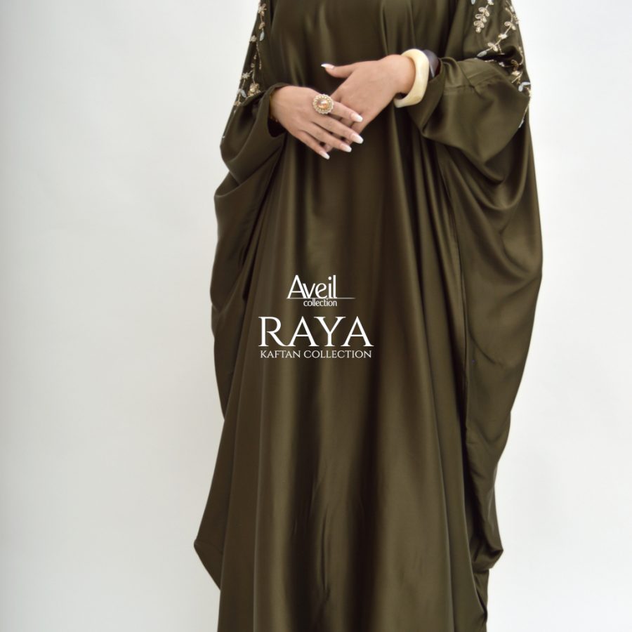 Model wearing Raya Luxury Closed Kaftan Abaya in satin with batwing silhouette and gold pearl embroidery